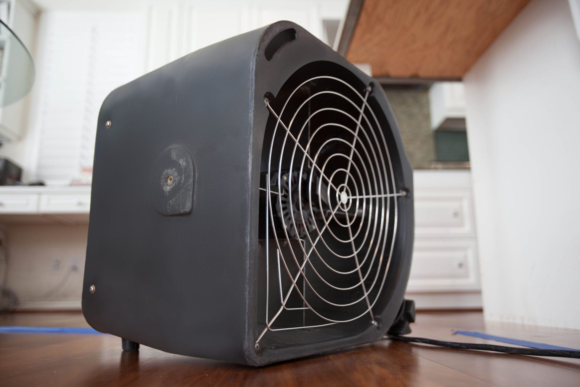 Industrial Fan For Water Damage In Kitchen