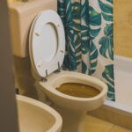 bathroom needing sewage backup cleanup and restoration