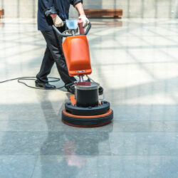 cleaning floor with machine