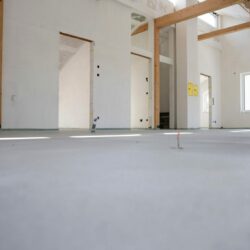 freshly cured concrete screed on construction site in loft in a family house